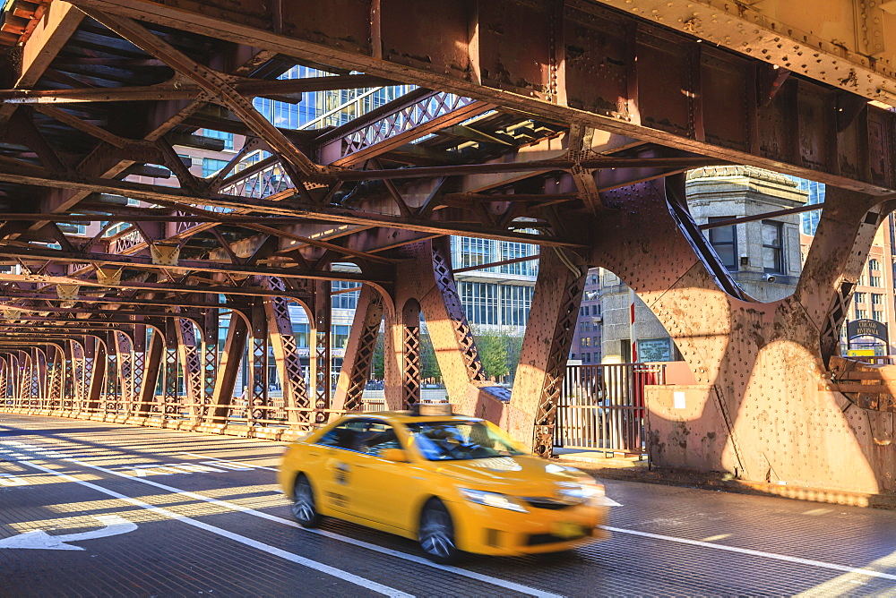 Yellow taxi crossing a bridge over the Chicago River, Chicago, Illinois, United States of America, North America