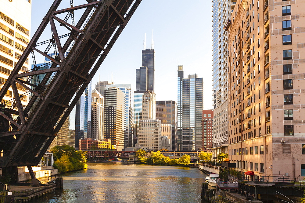 Chicago River and towers of the West Loop area,Willis Tower, formerly the Sears Tower in the background, a raised disused railway bridge in the foreground, Chicago, Illinois, United States of America, North America