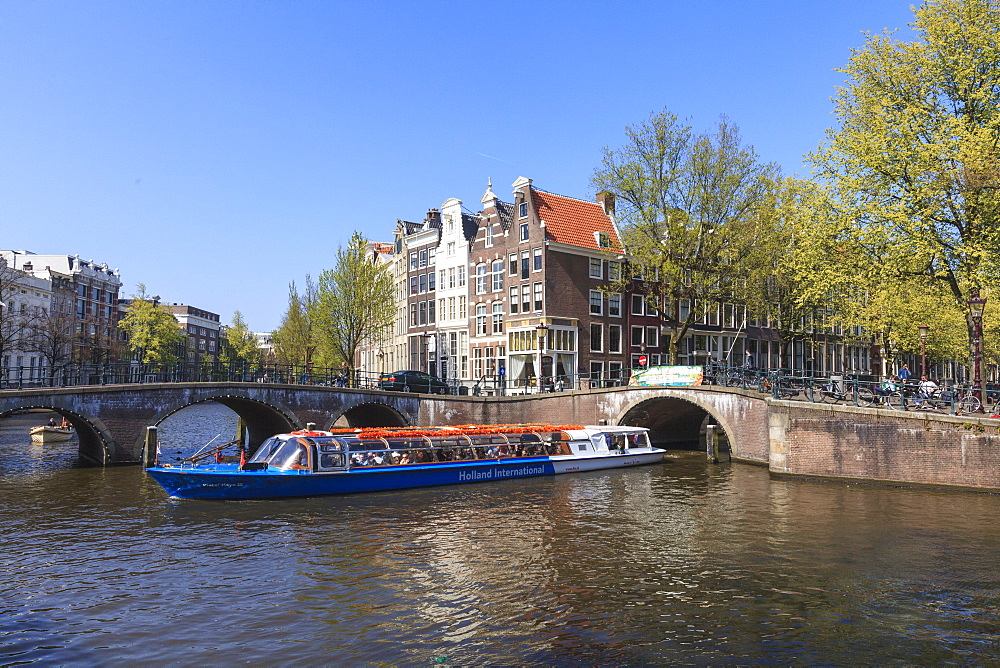 Tourist boat on the Keizersgracht Canal, Amsterdam, Netherlands, Europe