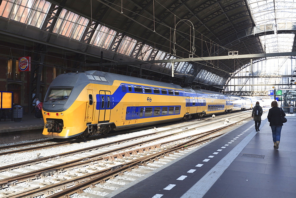 Intercity train in a platform at Central Station, Amsterdam, Netherlands, Europe 