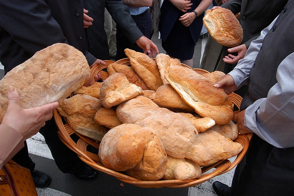 Bread distribution during Espiritu Santo Festival, Vila Nova, Azores, Portugal, Europe