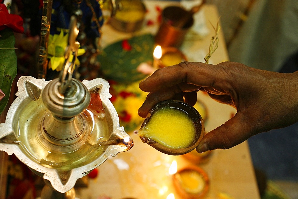 Oil lamp in a Sri Lankan temple, Paris, France, Europe