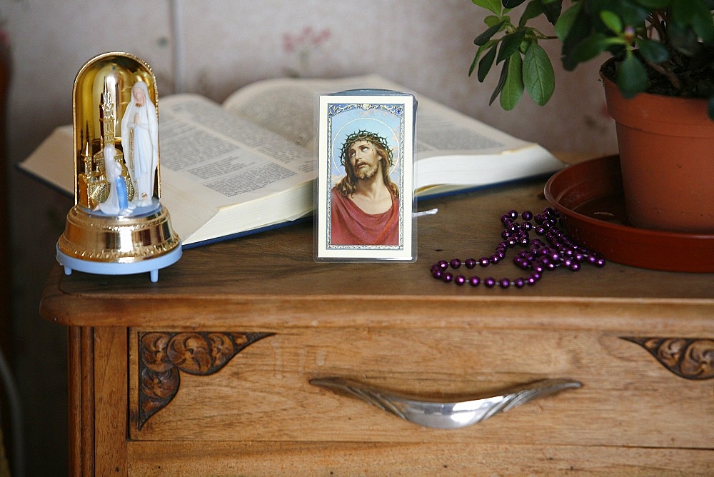 Religious paraphernalia in a bedroom, Chedde, Haute Savoie, France, Europe