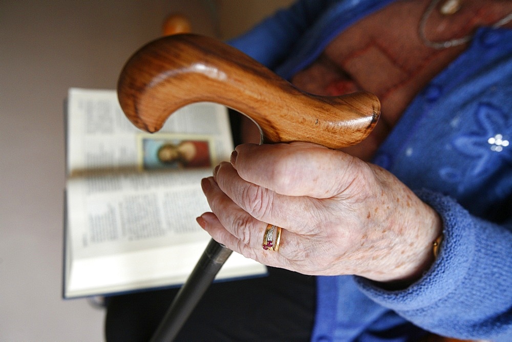 Elderly person reading the Bible, Chedde, Haute Savoie, France, Europe