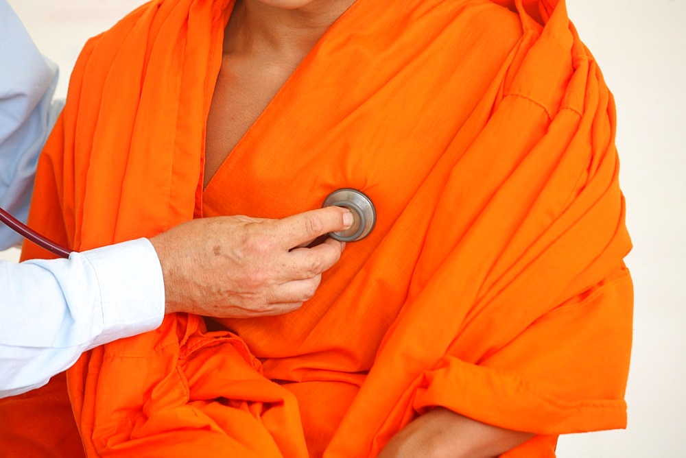 French doctor examining monk, Luang Prabang, Laos, Indochina, Southeast Asia, Asia