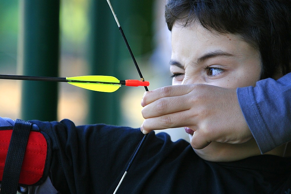 Boy doing archery, Forges-les-Eaux, Seine Maritime, France, Europe