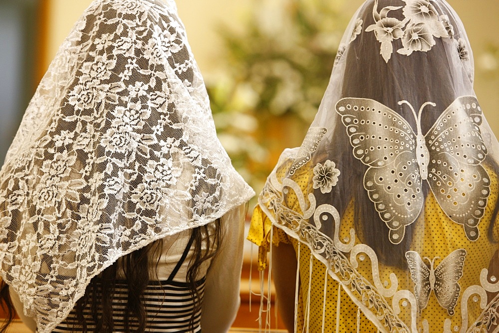 Women wearing embroidered veils at Holy Mass, Beit Jala, West Bank, Palestine National Authority, Middle East