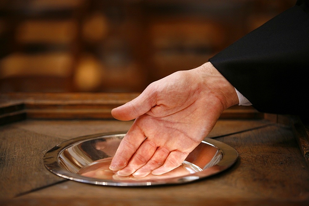 Protestant minister conducting baptism, Paris, Ile de France, France, Europe