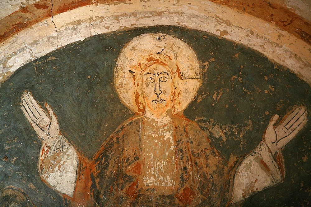 A 12th century Romanesque fresco depicting Jesus Christ in St. Chef abbey church, Saint-Chef-en-Dauphine, Isere, France, Europe