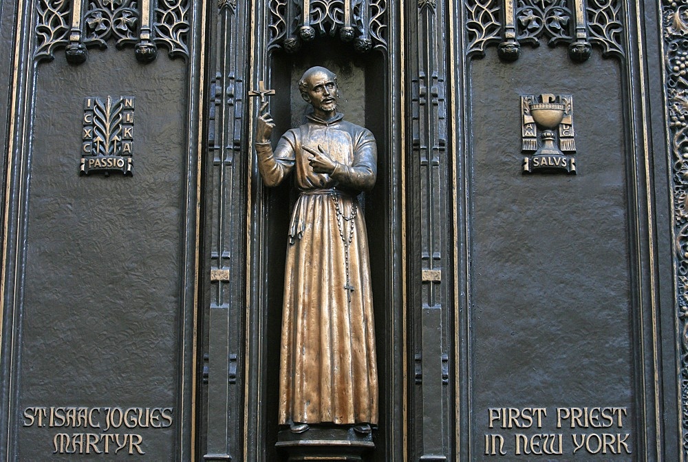 Front gate sculpture of St. Isaac Jogues, New York's first Catholic priest, St. Patrick's Cathedral, New York City, New York, United States of America, North America