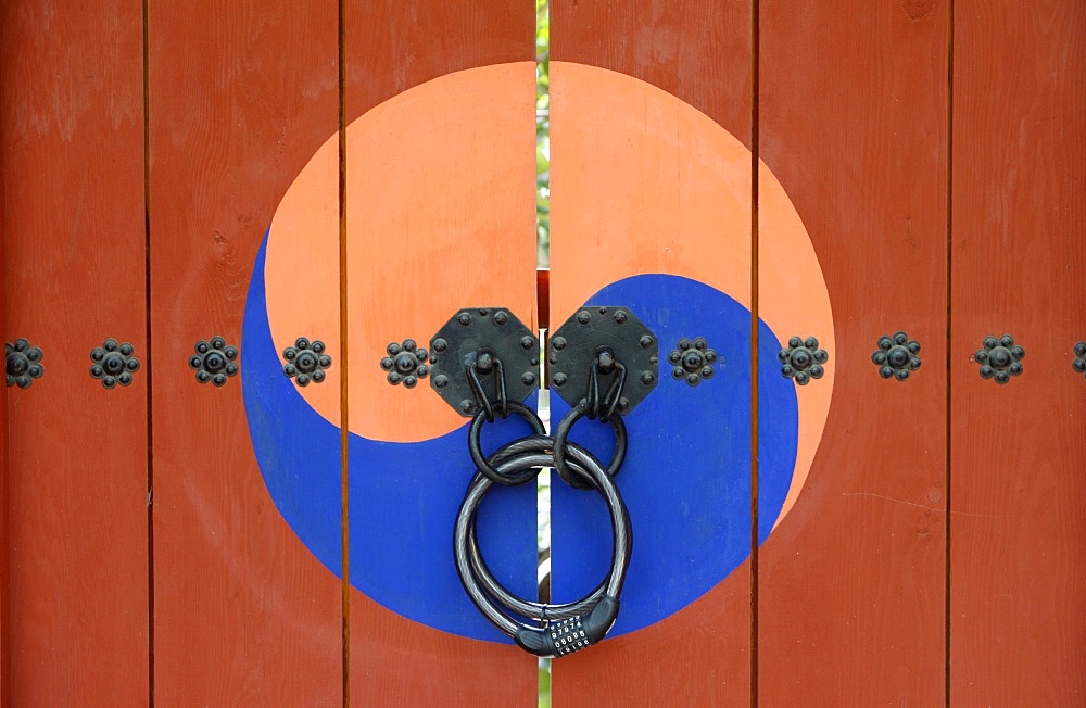 Yin and yang symbols on temple door, Seoul, South Korea, Asia