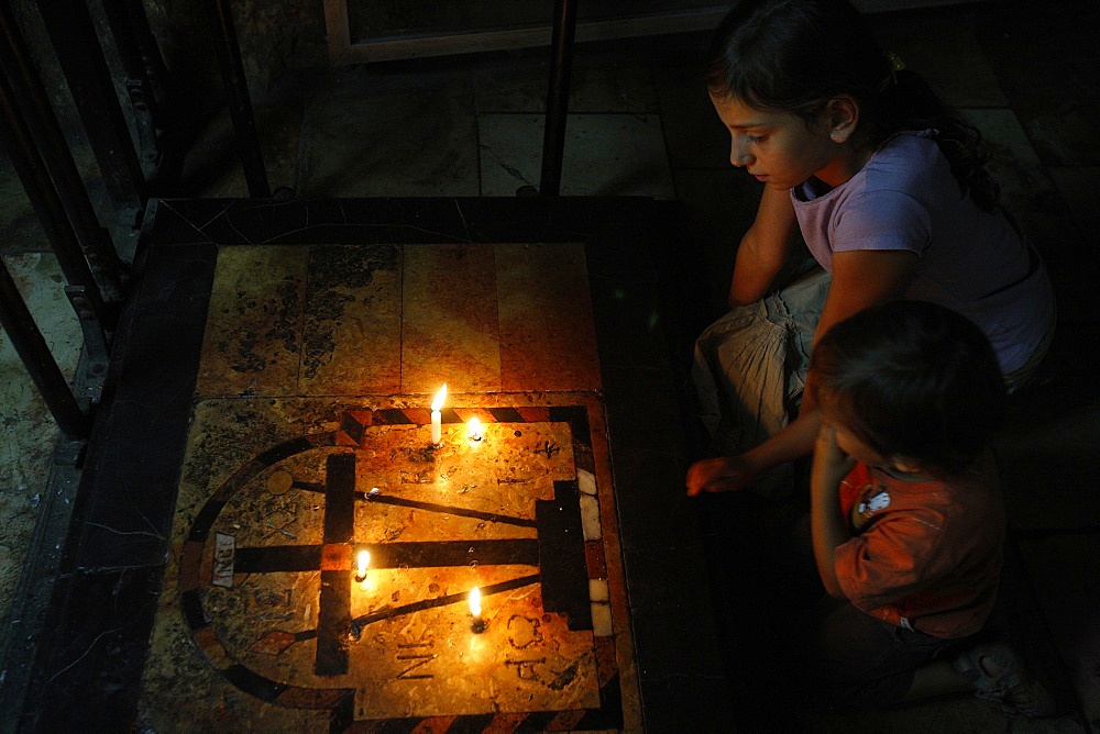 Children in the Holy Sepulchre church, Jerusalem, Israel, Middle East