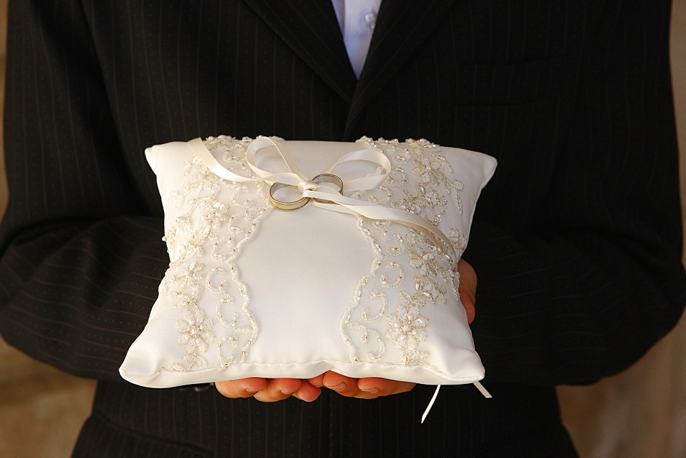 Boy holding the rings at Catholic wedding, Jerusalem, Israel, Middle East