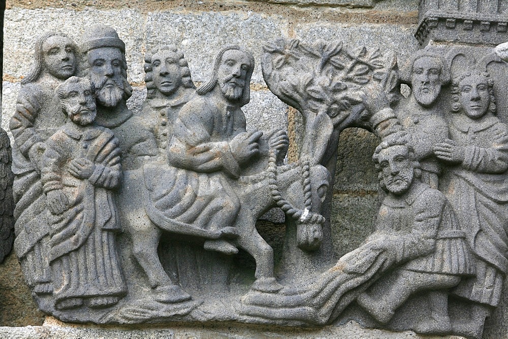 A scene from the Life of Jesus on the Guimiliau calvary, Guimiliau, Finistere, Brittany, France, Europe