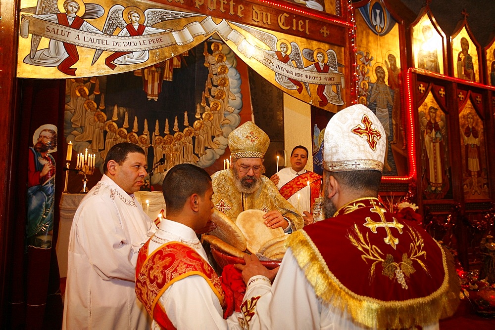 Blessing of the bread during Orthodox Coptic celebration, Chatenay-Malabry, Hauts de Seine, France, Europe