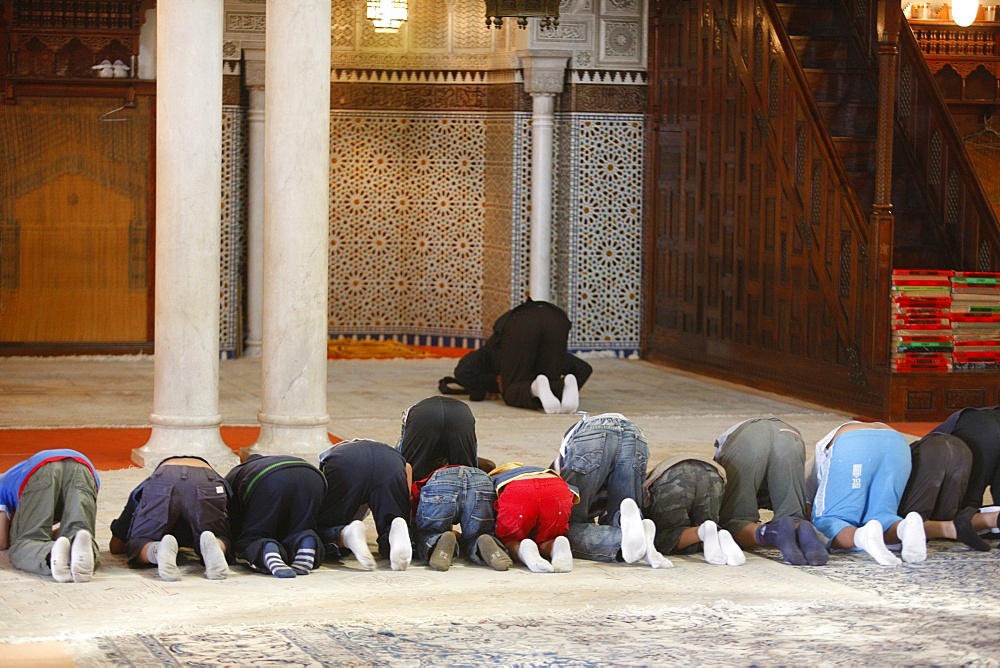 Young Muslims learning how to pray, Paris, France, Europe