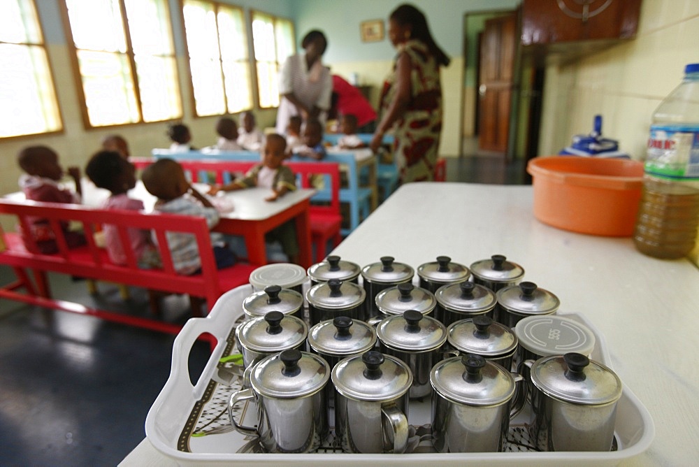 Meal time at a nursery and kindergarten run by Catholic nuns, Lome, Togo, West Africa, Africa