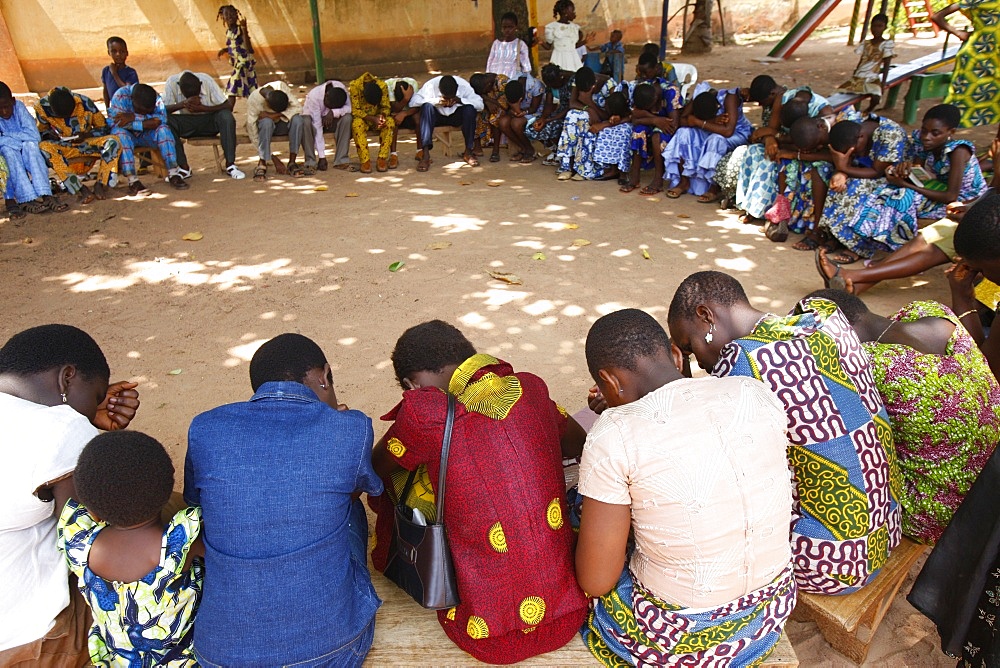 Group prayer in an Evangelical church, Kpalime, Togo, West Africa, Africa