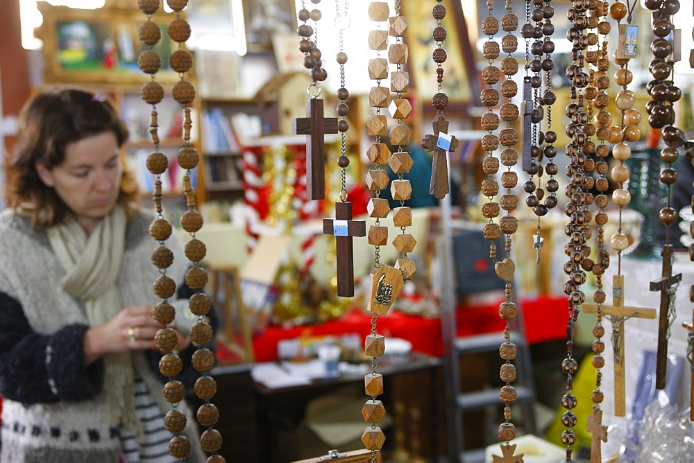 Religious objects sold at a flea market, Cluses, Haute Savoie, France, Europe