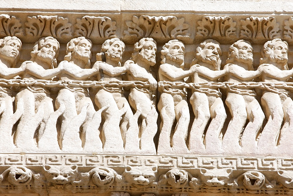 The damned, Saint-Trophime church tympanum, Arles, Bouches-du-Rhone, France, Europe