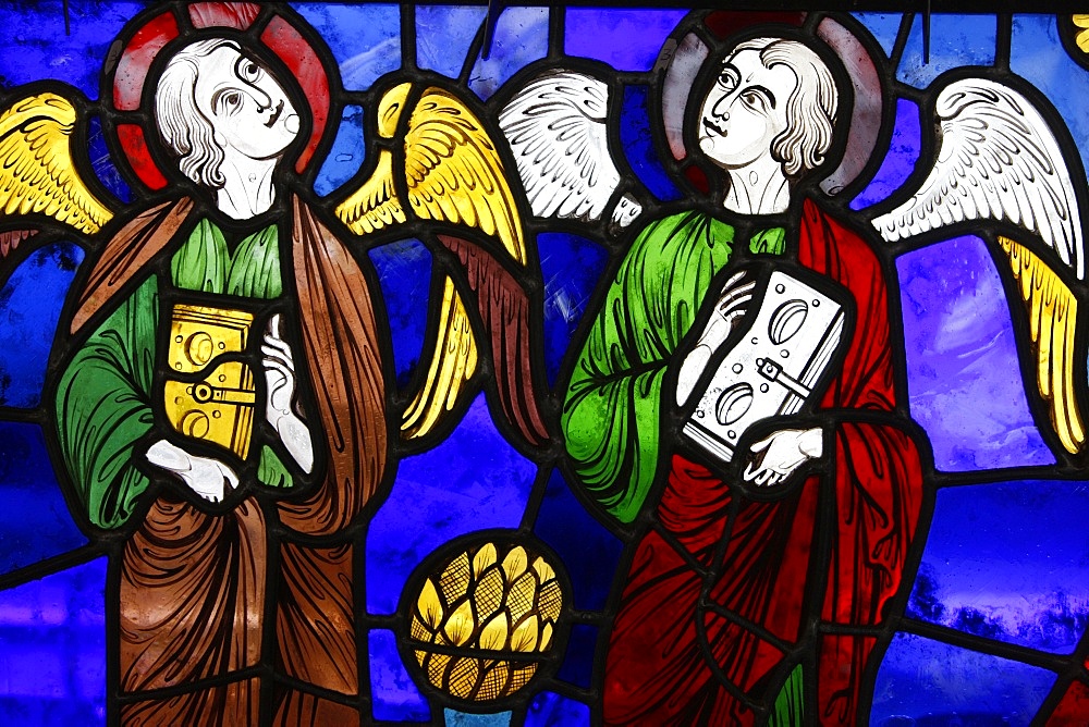 Two angels in stained glass at The International Stained Glass Centre, Chartres, Eure-et-Loir, France, Europe