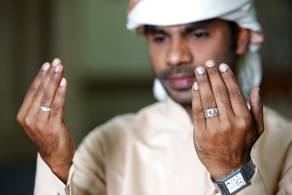 Muslim man praying, Dubai, United Arab Emirates, Middle East