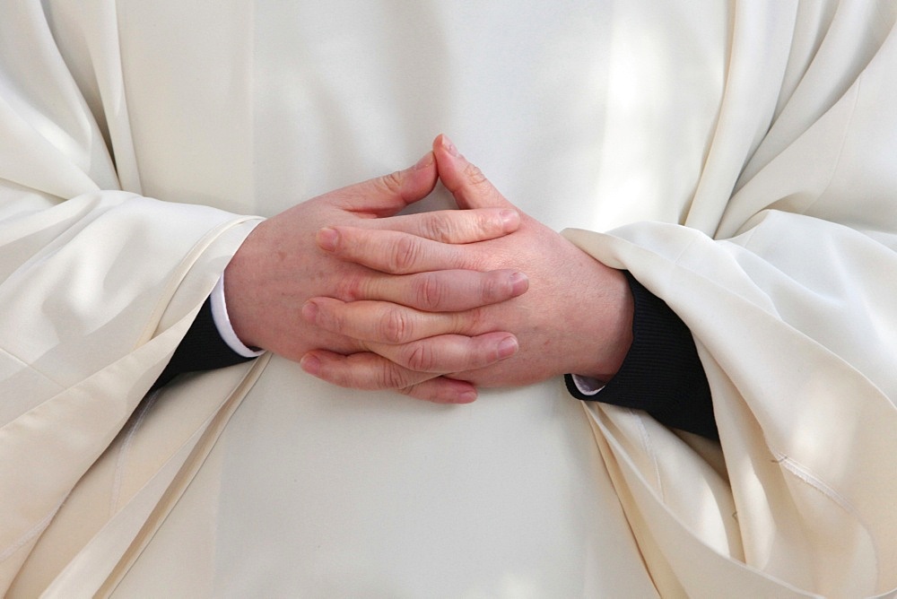 Priest's hands, Paris, France, Europe