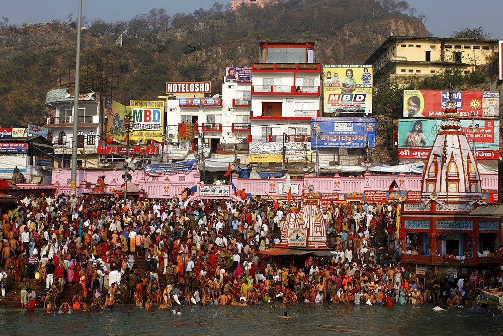 Thousands of devotees converge in Haridwar to take a dip in the river Ganges on the occasion of Navsamvatsar, a Hindu holiday taking place during the Maha Kumbh Mela festival, Haridwar, Uttarakhand, India, Asia