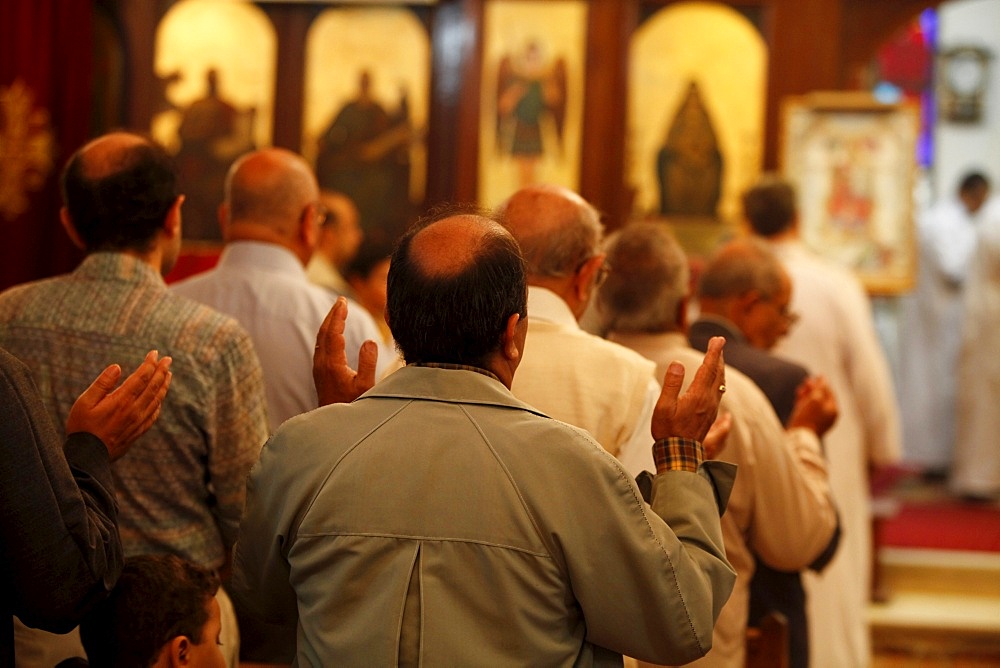 Men's section during celebration in Abbassiya Coptic church, Cairo, Egypt, North Africa, Africa