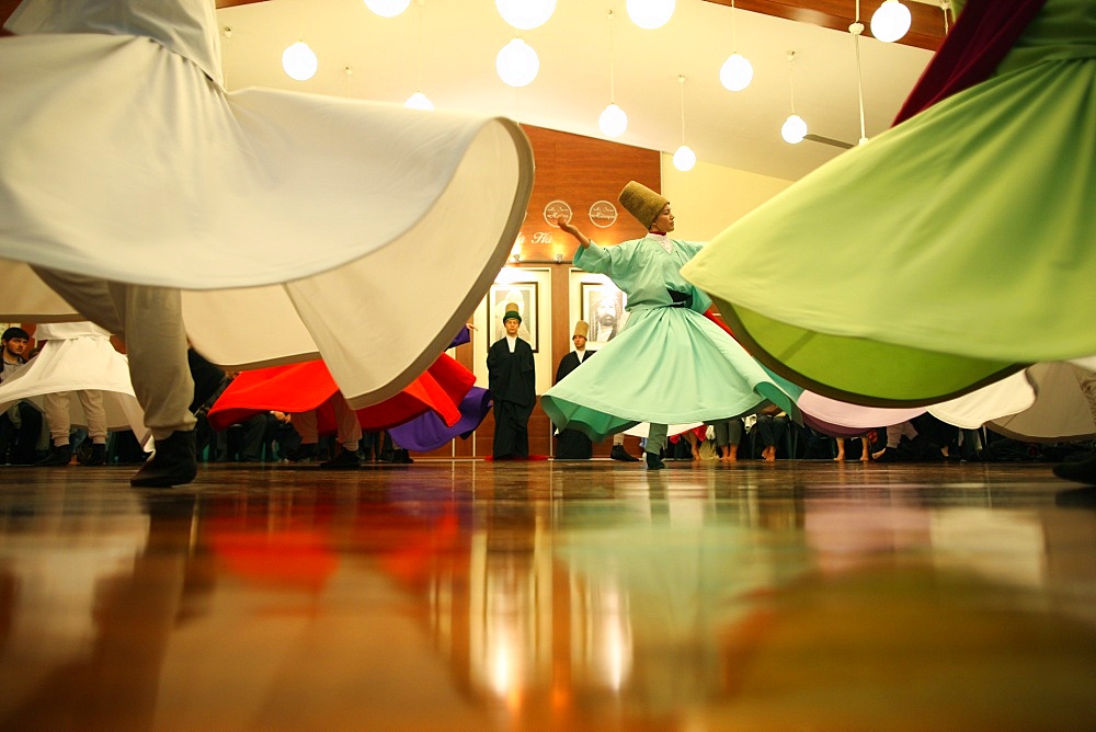 Whirling dervish performance in Silvrikapi Meylana cultural center, Istanbul, Turkey, Europe