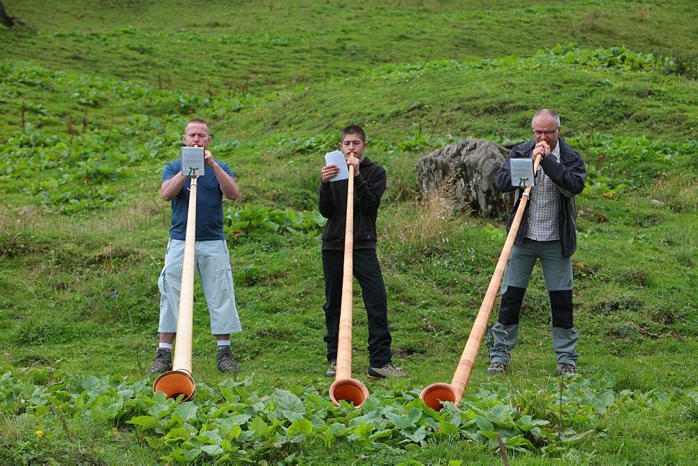 Horn blowers in the French Alps, Doran, Haute-Savoie, France, Europe