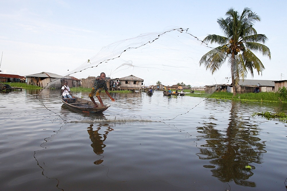 Fishing in Ganvie lake village on Nokoue Lake, Benin, West Africa, Africa