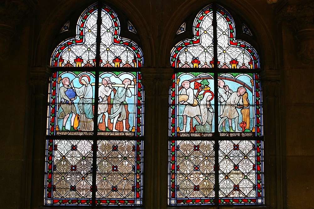 Stained glass depicting Sainte Genevieve's life, cloister of Notre-Dame de Paris cathedral, Paris, France, Europe