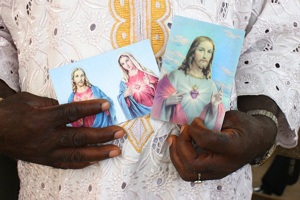 Religious images of Christ and Mary, Lome, Togo, West Africa, Africa