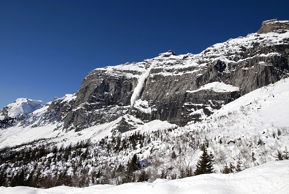 Snow-covered rocks in the French Alps, Plateau d'Assy, Haute-Savoie, France, Europe