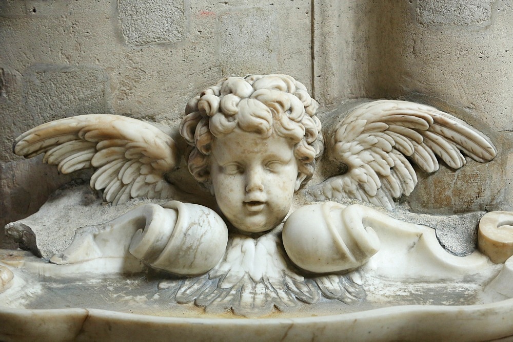 The 17th century holy water font, St. Germain l'Auxerrois church, Paris, France, Europe