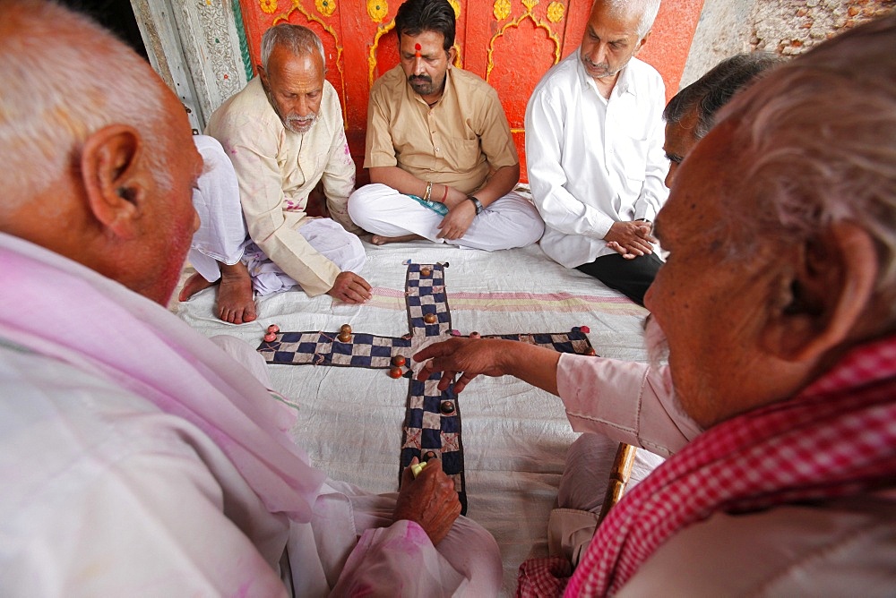 Senior men playing a game, Mathura, Uttar Pradesh, India, Asia