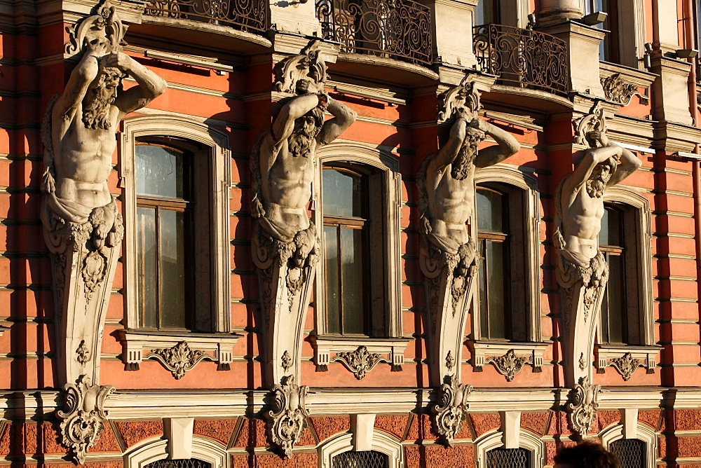 Atlantes holding up columns of Beloselsky-Belozersky Palace, St. Petersburg, Russia, Europe