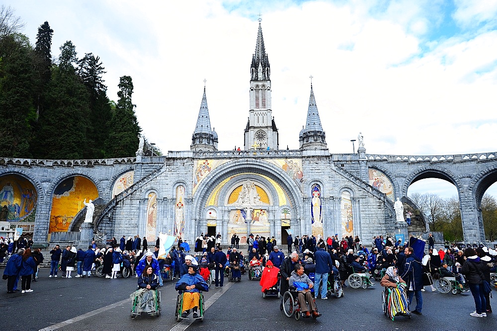 Gathering at Notre-Dame-du-Rosaire's basilica in the city of Lourdes, Hautes-Pyrenees, France, Europe