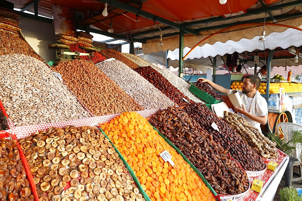 Dried nuts and fruits on a stand in a souk in Marrakech, Morocco, North Africa, Africa