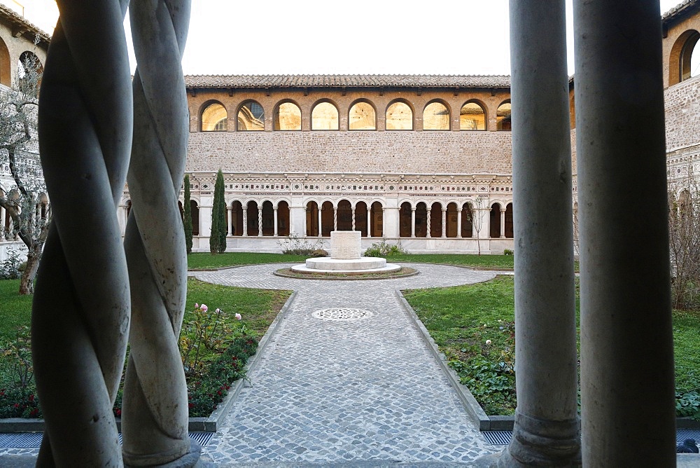 Twisted columns of  marble in the Vassaletto cloisters in the Papal Arch basilica of St. John Lateran, Rome, Lazio, Italy, Europe