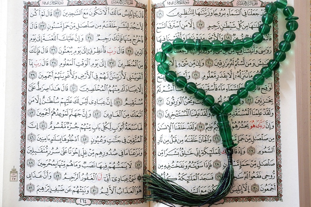 Koran and prayer beads, Paris, France, Europe