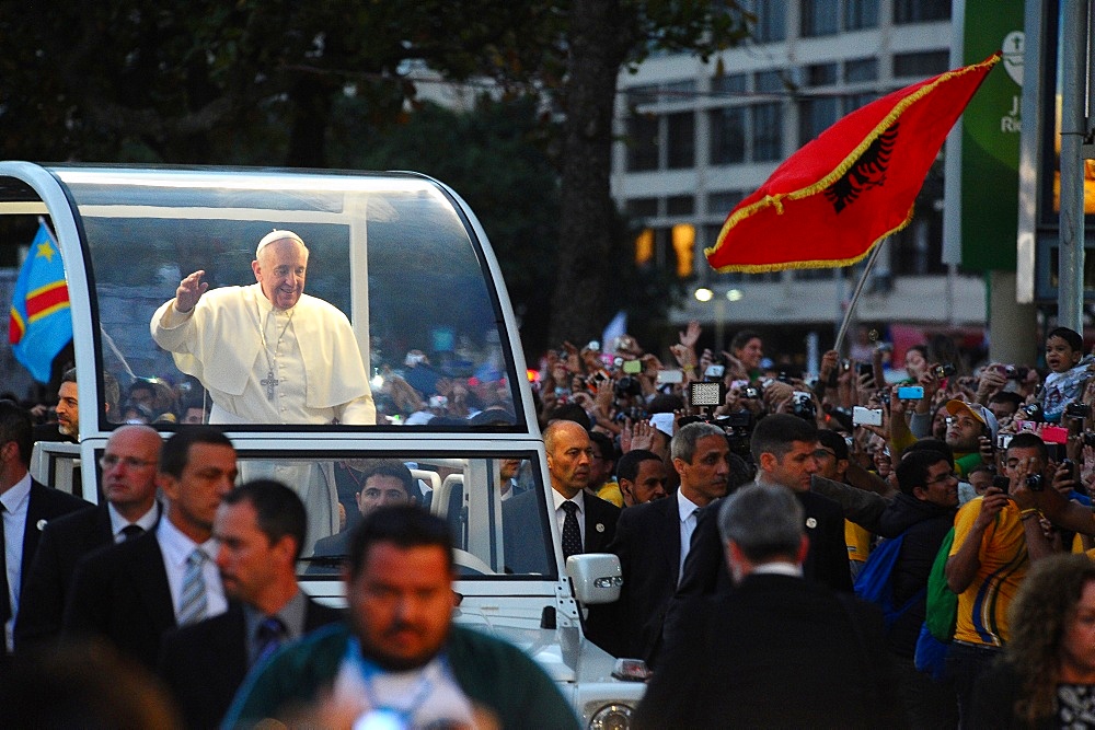 Pope Francis waves to the crowd while riding in the Popemobile, World Youth Day 2013, Rio de Janeiro, Brazil, South America