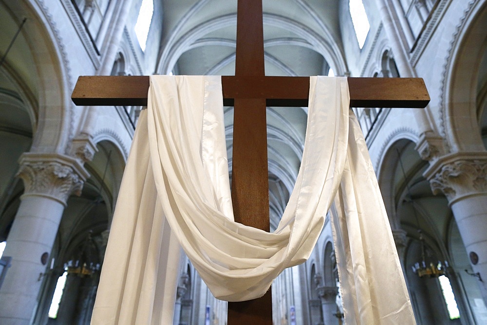 The cross and the white cloth symbolize the resurrection of Jesus, Holy Week, St. Ambroise church, Paris, France, Europe