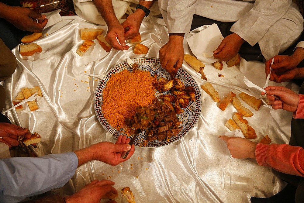 Muslims sharing a meal, Nandy, Seine-et-Marne, France, Europe