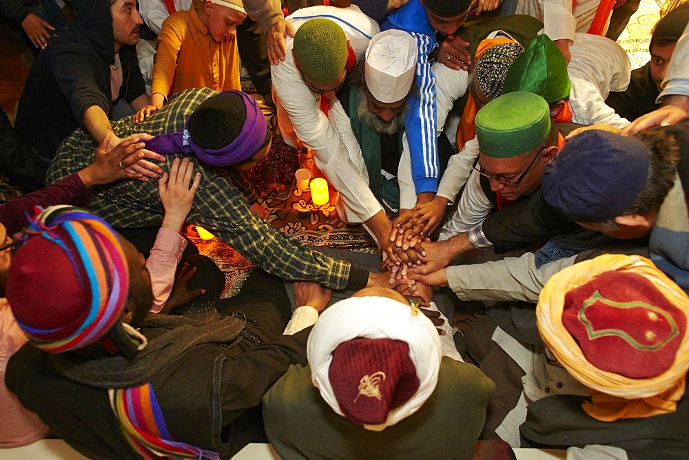 Naqshbandi Sufis joining hands, Paris, France, Europe