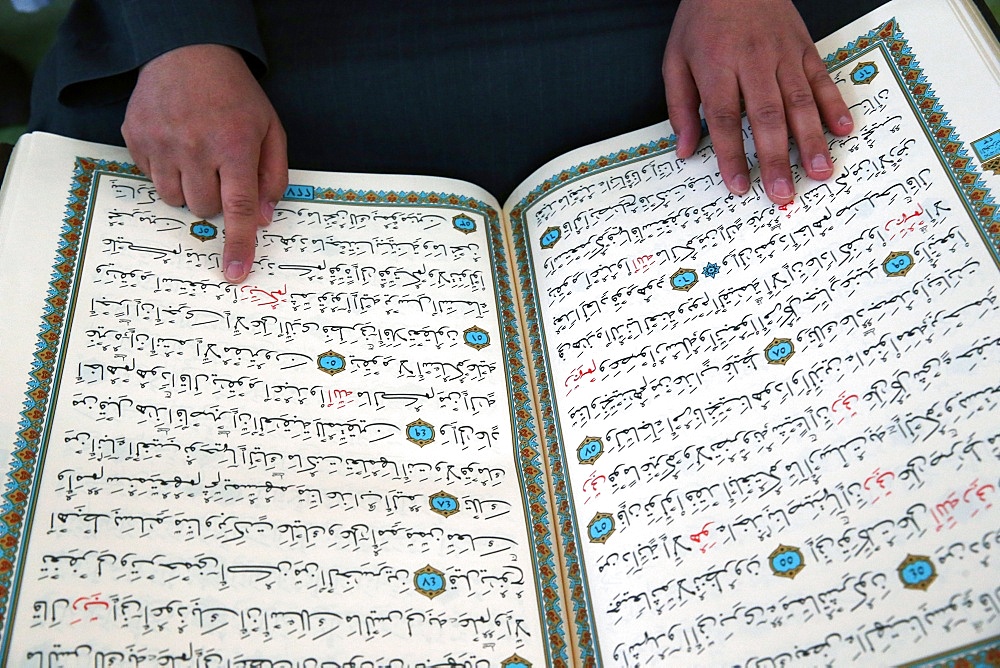 Imam reading the Quran in a mosque, Seine-e-Marne, France, Europe