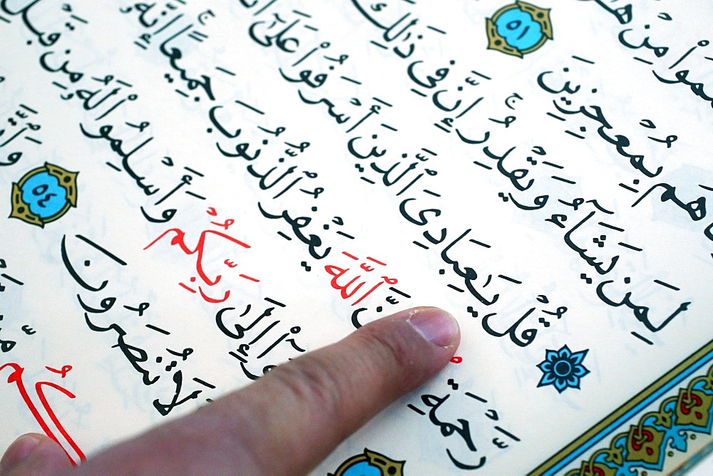 Imam reading the Quran in a mosque, Seine-e-Marne, France, Europe