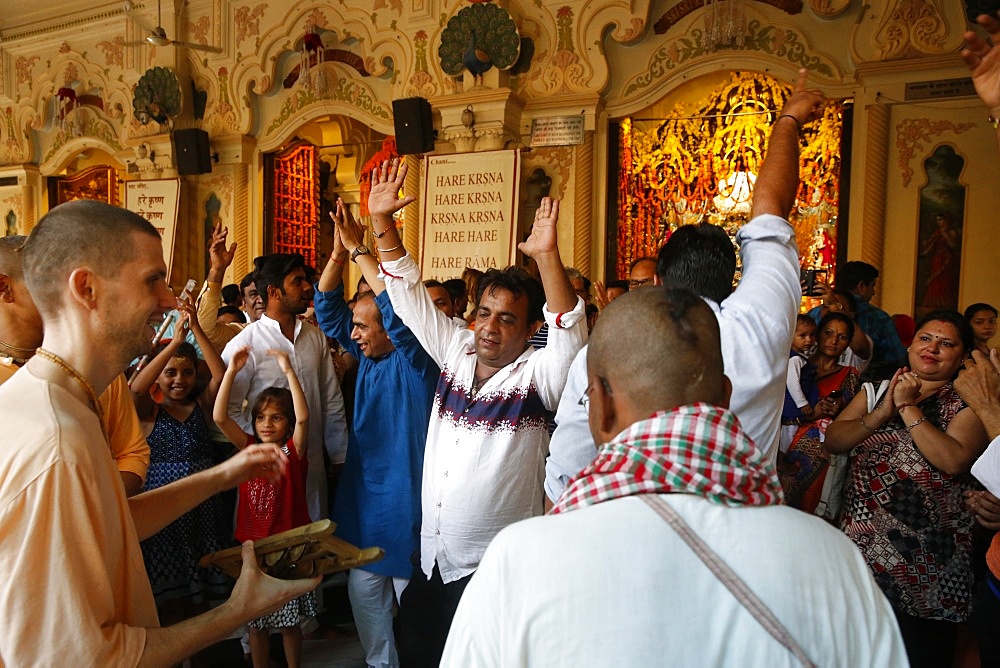 Dancing and chanting at Krishna-Balaram temple, Vrindavan, Uttar Pradesh, India, Asia