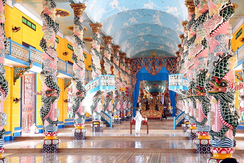 Interior of Cao Dai Great Temple with ornate dragon columns, Tay Ninh, Vietnam, Indochina, Southeast Asia, Asia